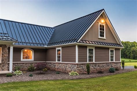 brown metal roof residential house|homes with brown metal roofs.